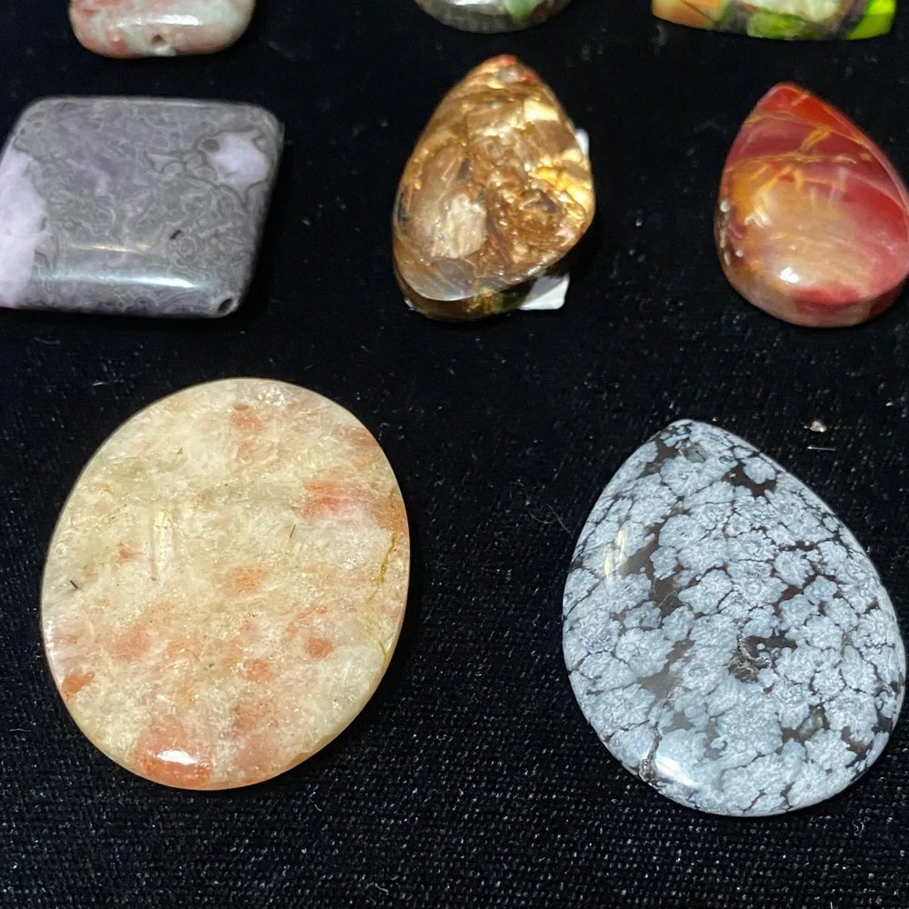 Eight assorted natural gemstones pendants for jewelry makers